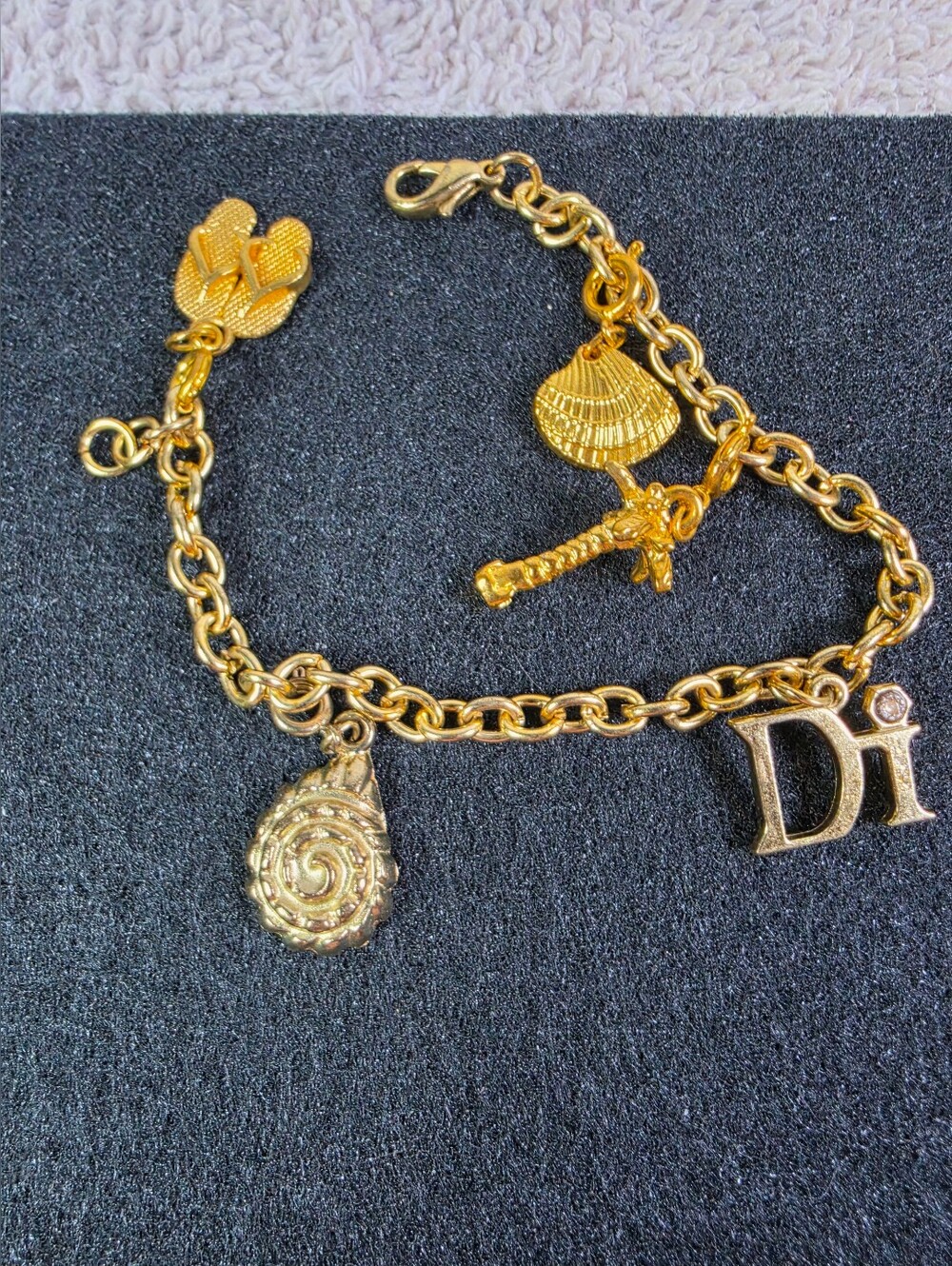 Gold Charm Bracelet with 'Di' Letter and Sea-themed Charms